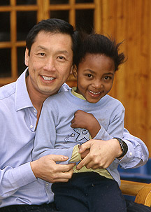 Dr. Lam with a little girl